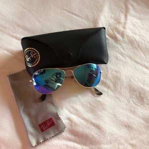 Ray-Ban polarized chromance with blue lenses.